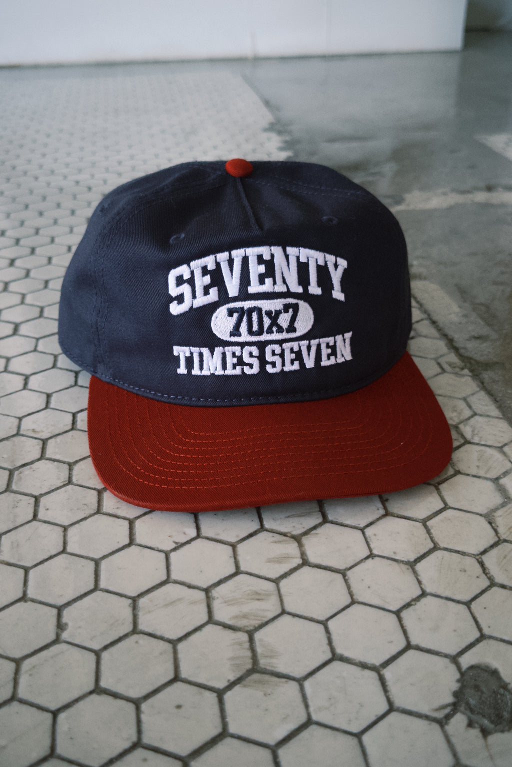SEVENTY TIMES SEVEN CAP